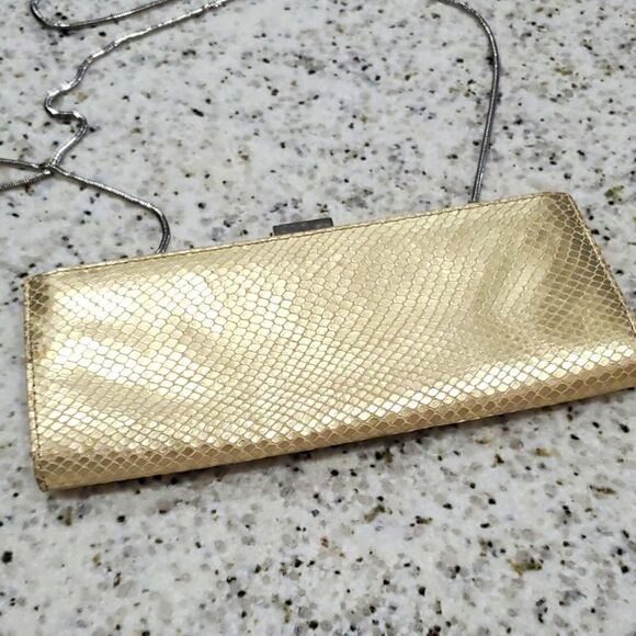 Adrienne Vittadini womans gold leather clutch with cross body strap - Picture 3 of 8